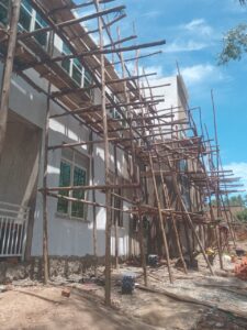 New mult purpose building under construction at Green hill high school Kamwenge